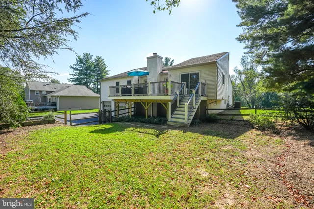a view of a house with a big yard
