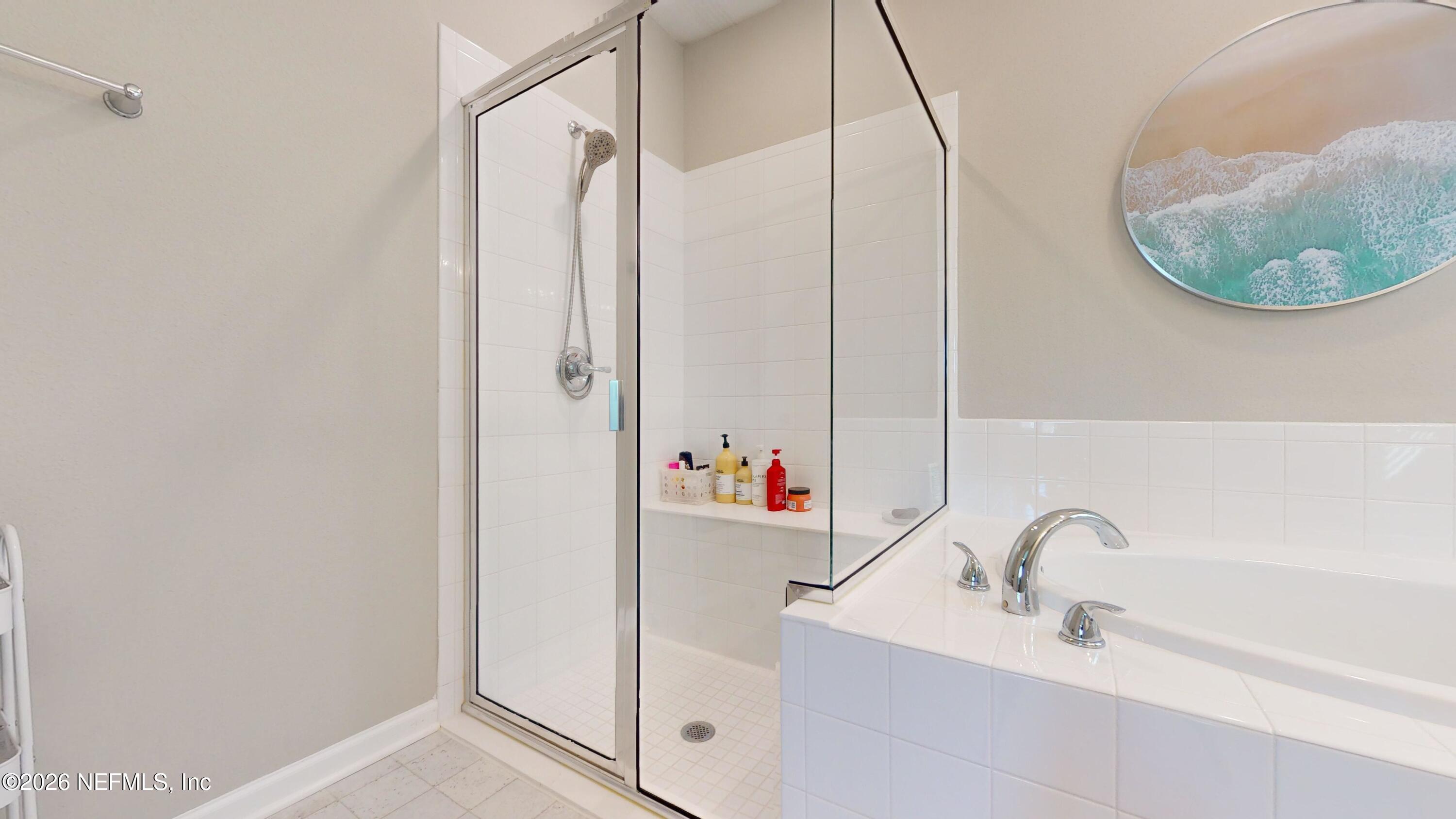 122 Field Flower Way St. Augustine, FL 32092 - Photo 38 of 55 a bathroom with a sink and a mirror