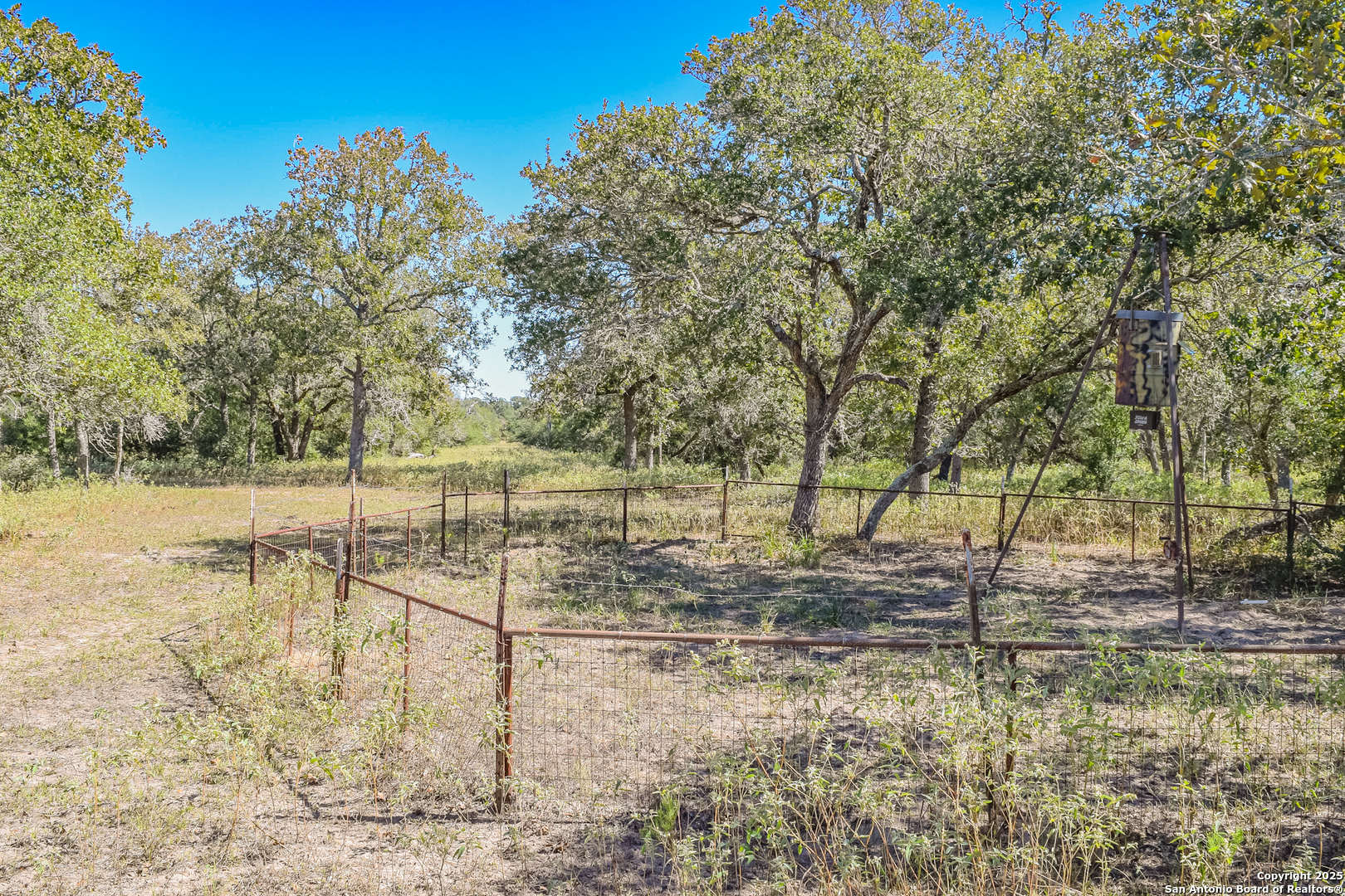 Tbd Fm 682 Yoakum, TX 77995 - Photo 11 of 68 a view of a yard with wooden fence