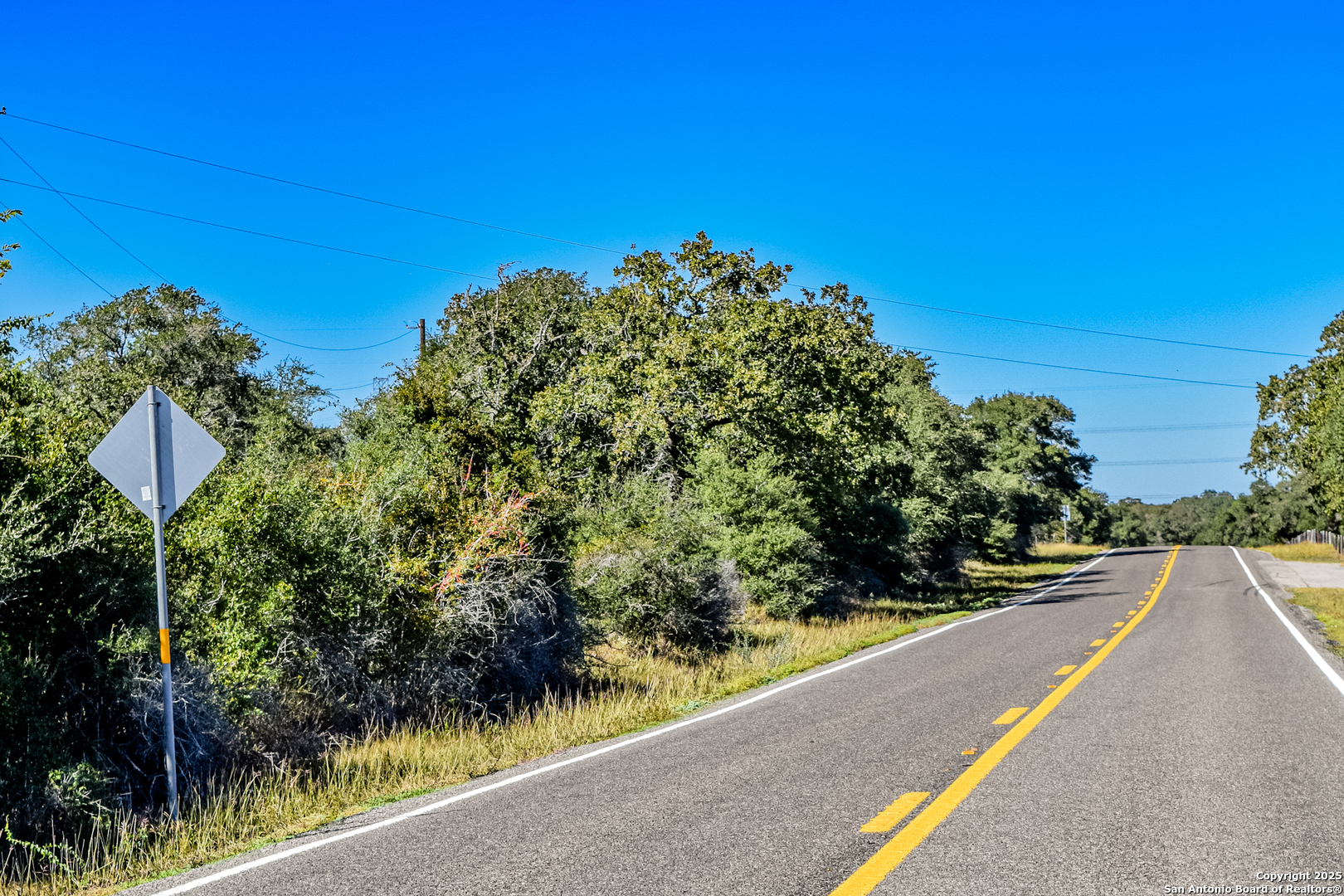Tbd Fm 682 Yoakum, TX 77995 - Photo 35 of 68 a view of a street with some trees in the background