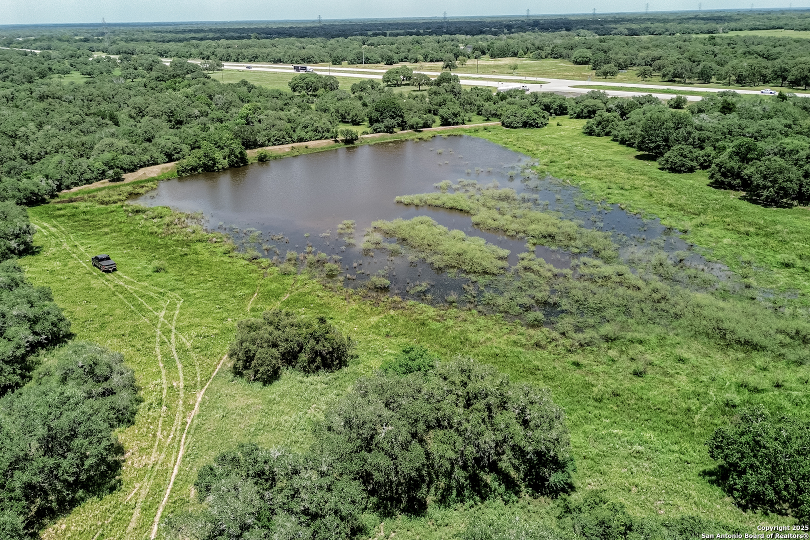 Tbd Fm 682 Yoakum, TX 77995 - Photo 43 of 68 an aerial view of green landscape with trees