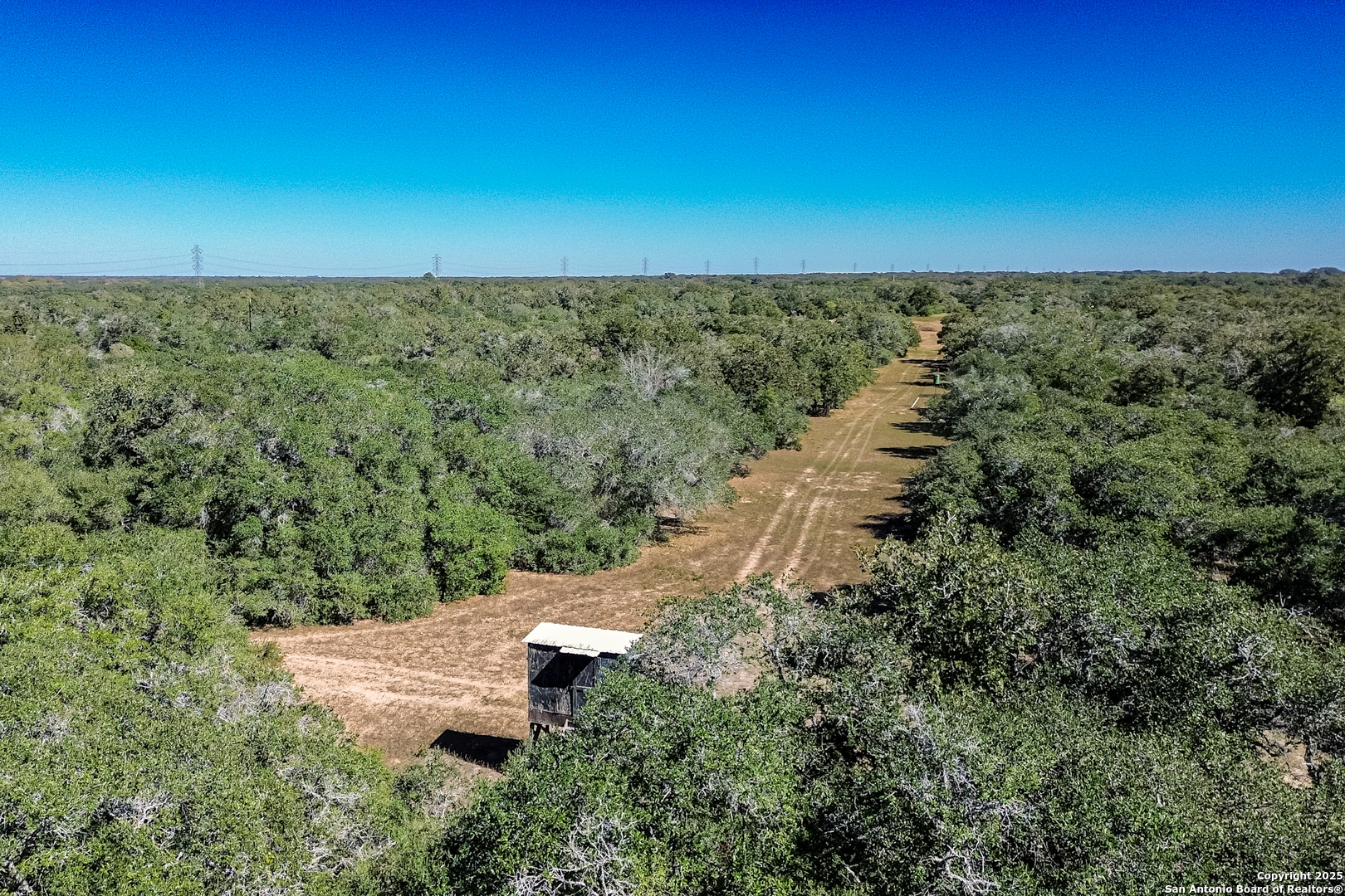 Tbd Fm 682 Yoakum, TX 77995 - Photo 61 of 68 an aerial view of a houses with outdoor space and trees all around