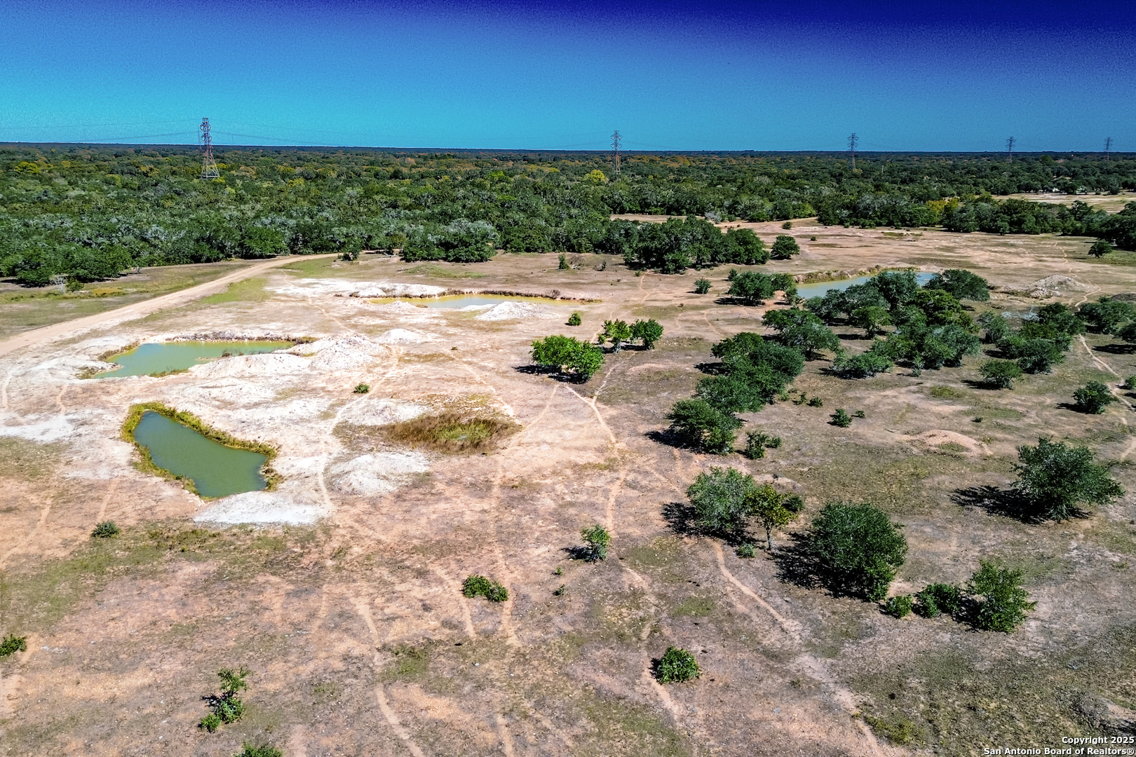 Tbd Fm 682 Yoakum, TX 77995 - Photo 66 of 68 a view of a lake with beach