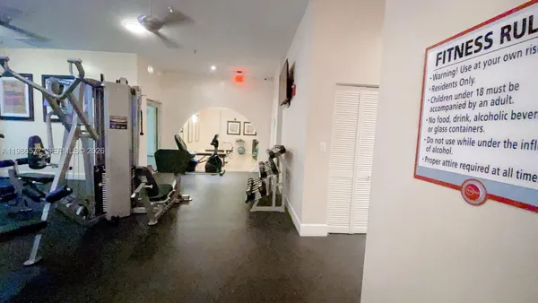 a view of a livingroom with furniture and stairs