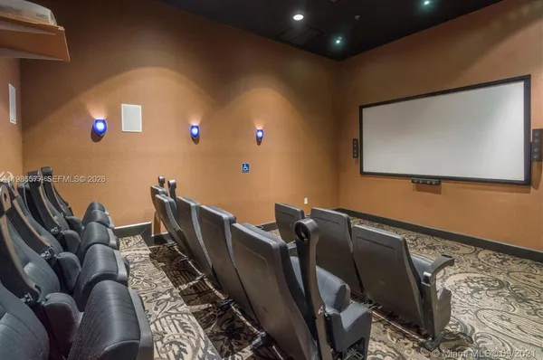 a front view of a house with a yard and sitting area