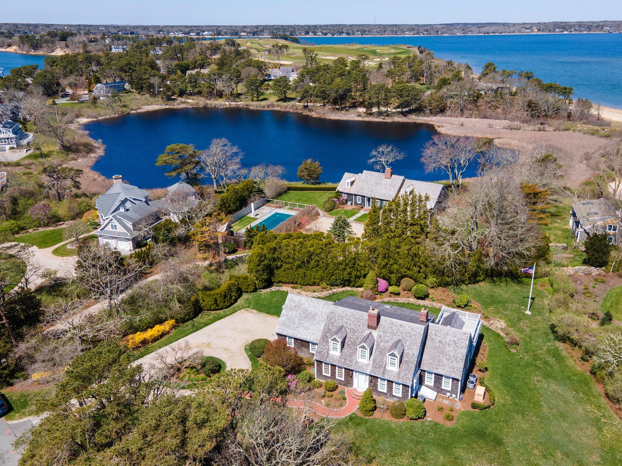 an aerial view of a house with a garden