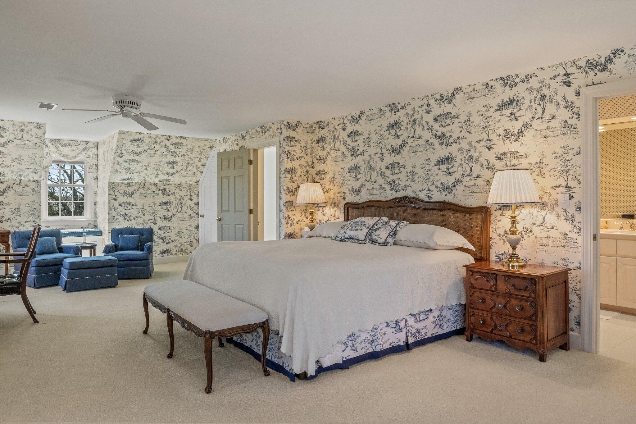 137 Strong Island Road Chatham, MA 02633 - Photo 18 of 37 a bedroom with a bed and a table in it