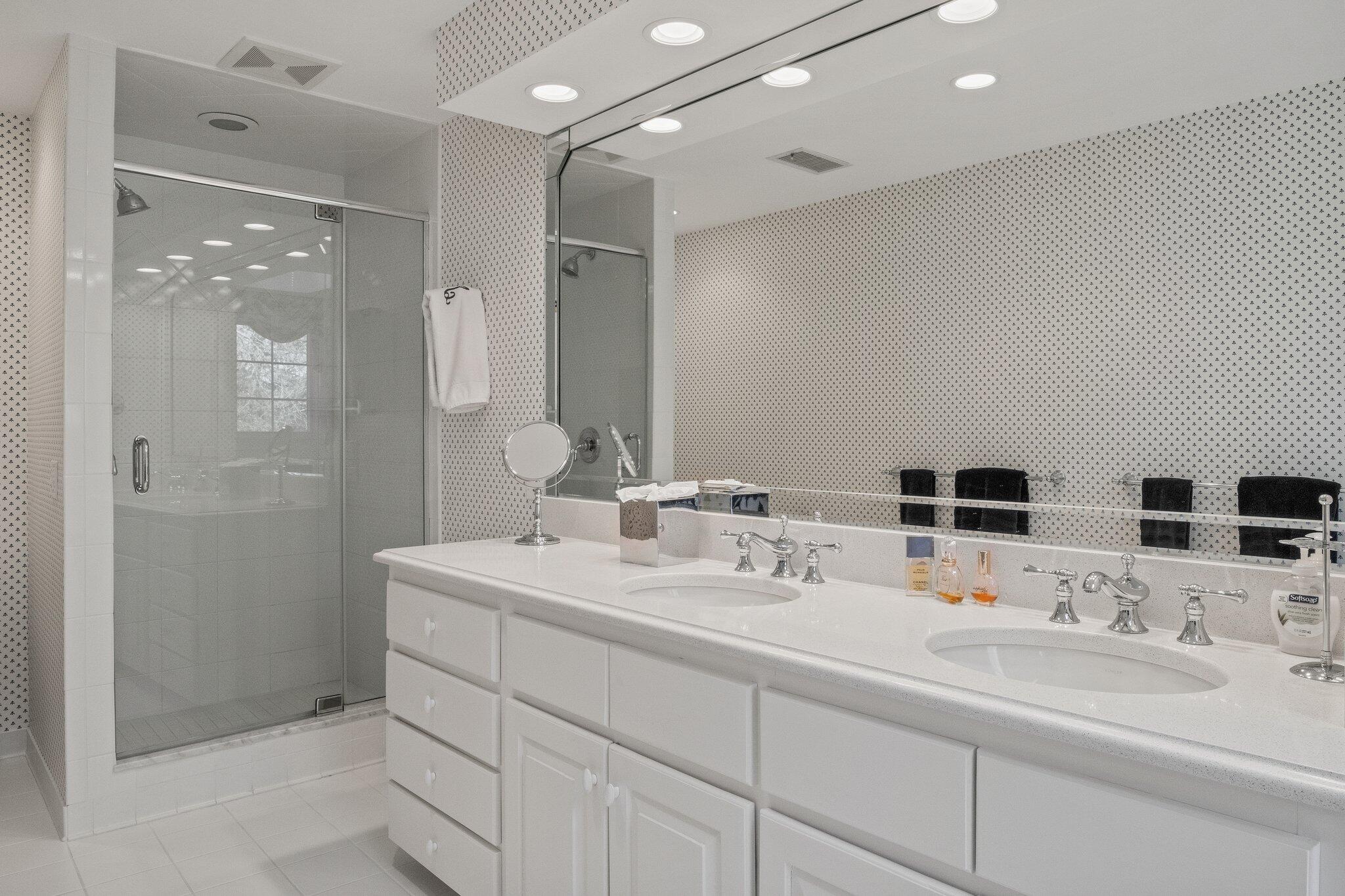 137 Strong Island Road Chatham, MA 02633 - Photo 19 of 37 a bathroom with double vanity sinks double vanity and a shower