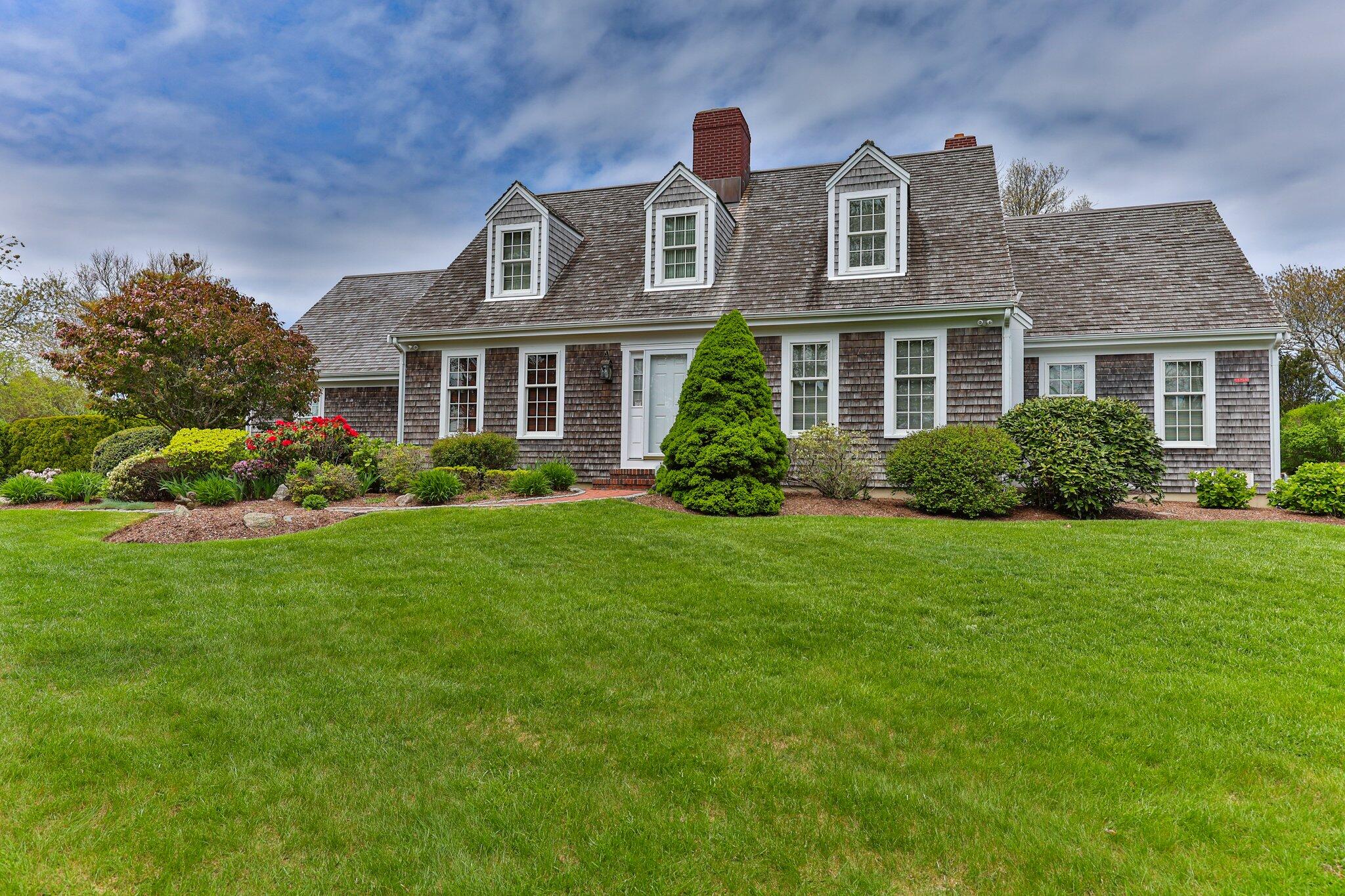 137 Strong Island Road Chatham, MA 02633 - Photo 2 of 37 a front view of house with yard and green space