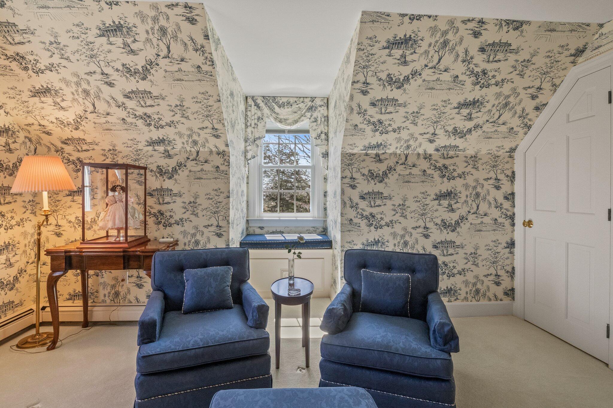 137 Strong Island Road Chatham, MA 02633 - Photo 22 of 37 a living room with furniture and a fireplace