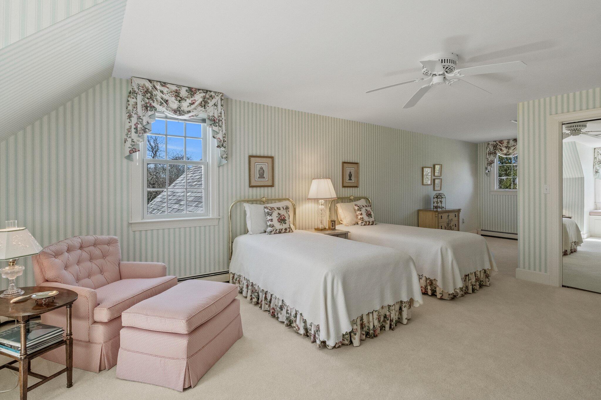137 Strong Island Road Chatham, MA 02633 - Photo 23 of 37 a spacious bedroom with a bed and a couch