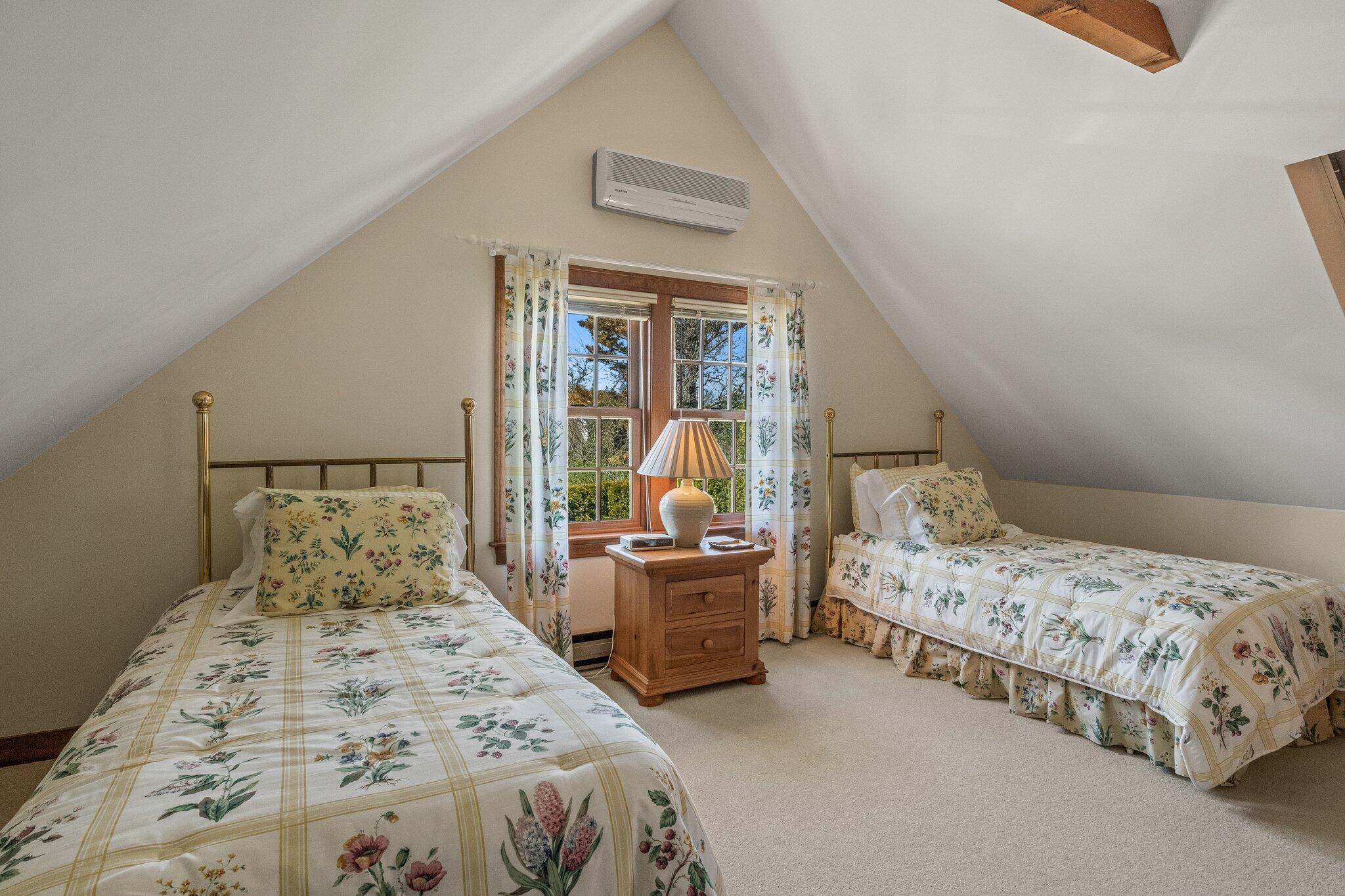137 Strong Island Road Chatham, MA 02633 - Photo 26 of 37 a bedroom with a bed and wooden floor