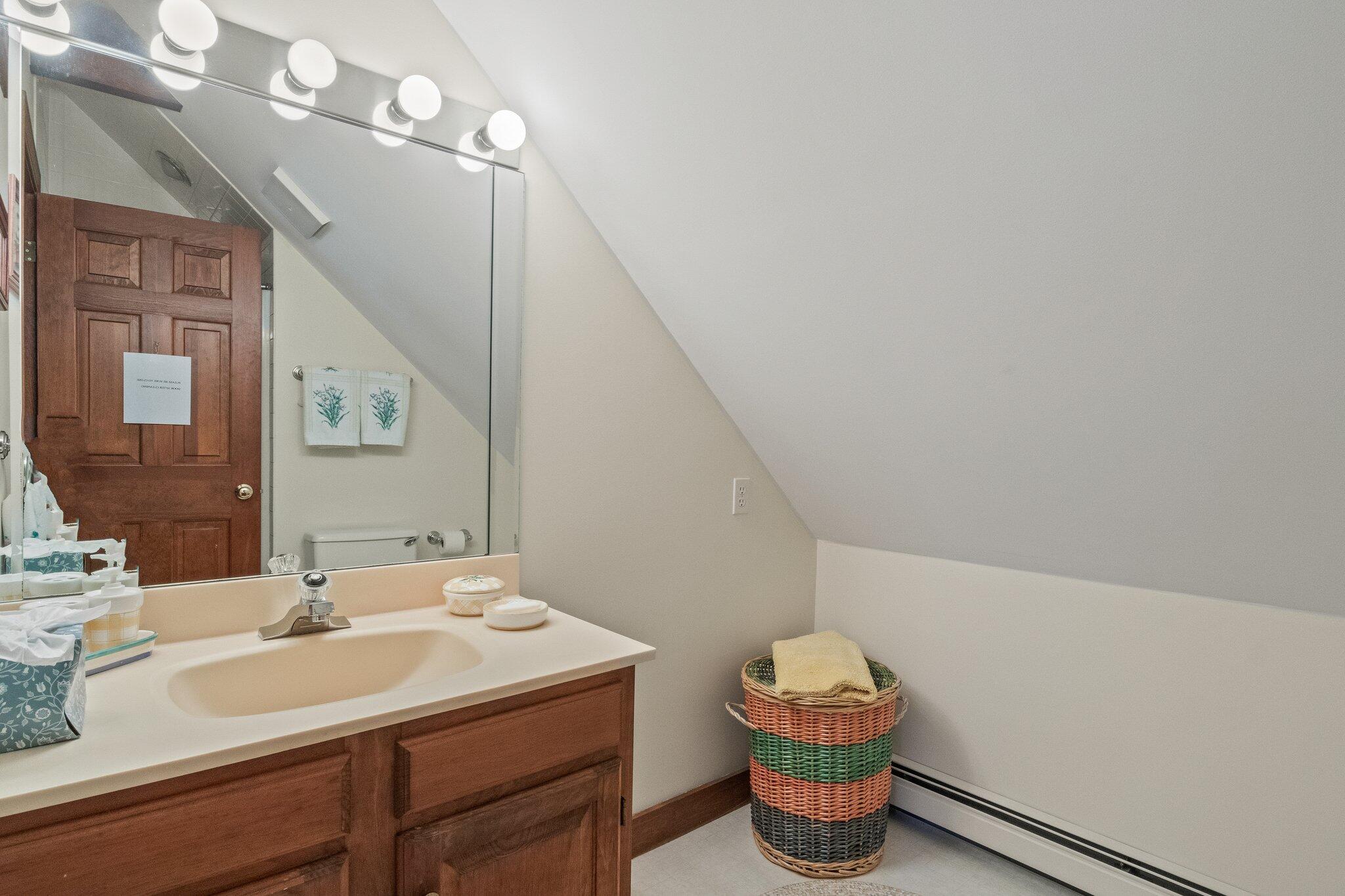 137 Strong Island Road Chatham, MA 02633 - Photo 27 of 37 a bathroom with a sink and a mirror