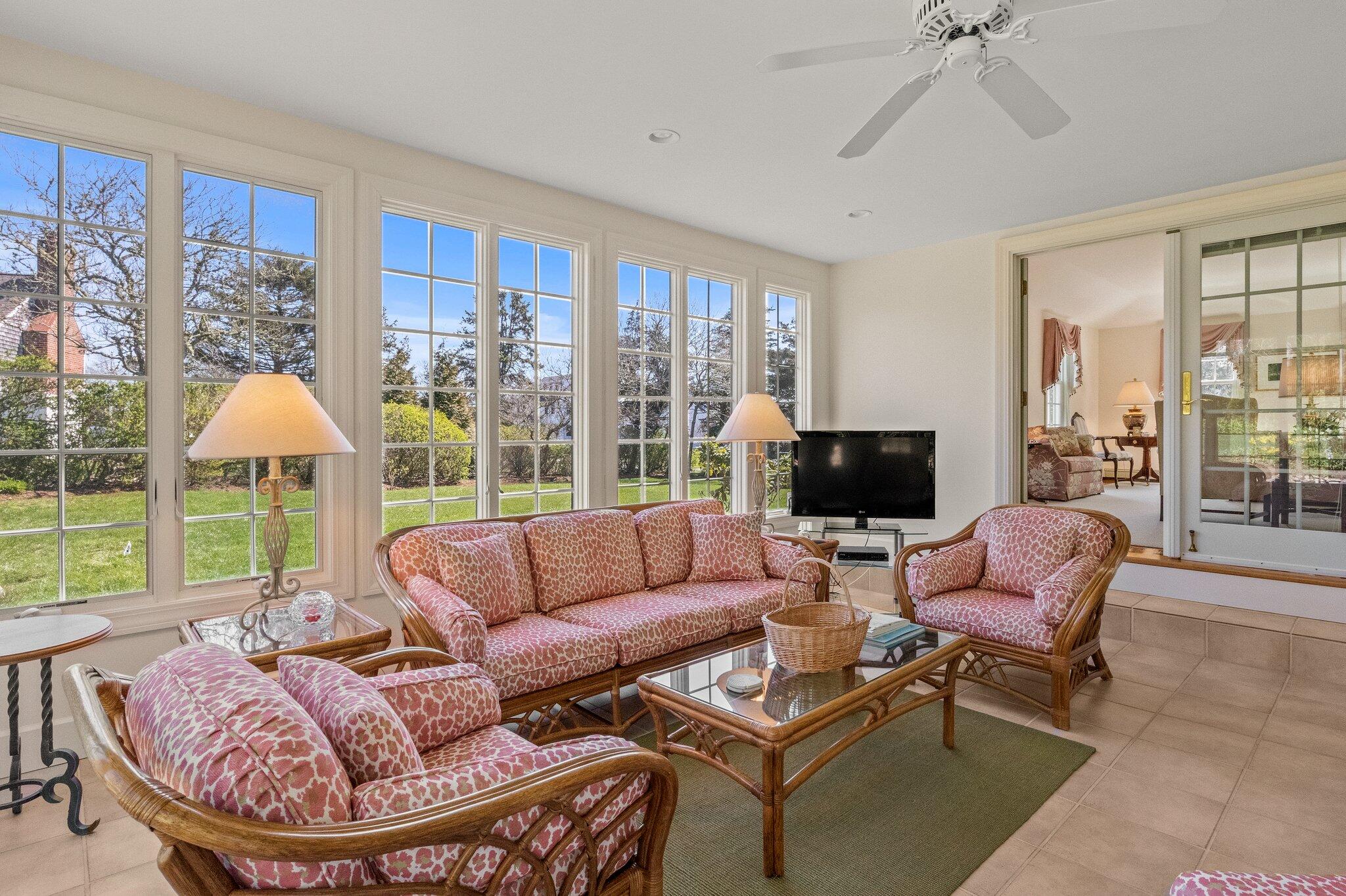 137 Strong Island Road Chatham, MA 02633 - Photo 6 of 37 a living room with furniture and a large window