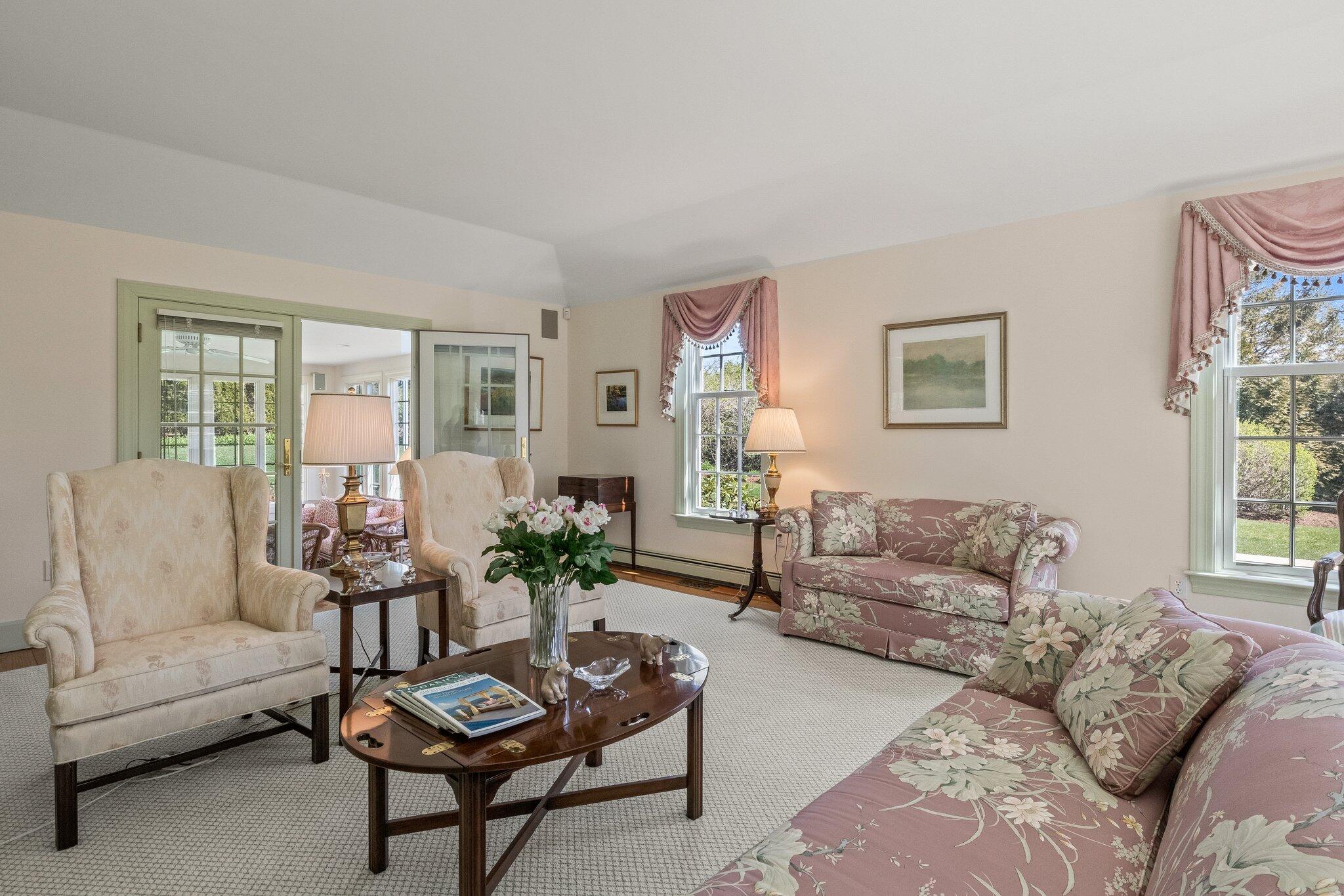 137 Strong Island Road Chatham, MA 02633 - Photo 7 of 37 a living room with furniture and a large window