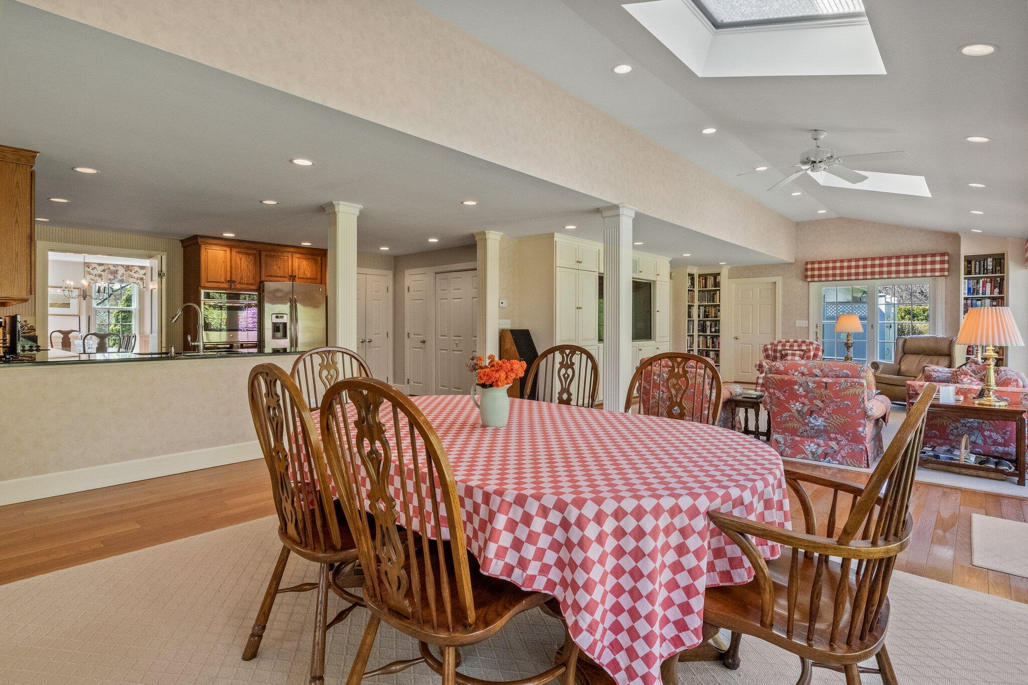 137 Strong Island Road Chatham, MA 02633 - Photo 10 of 37 a large kitchen with a table and chairs