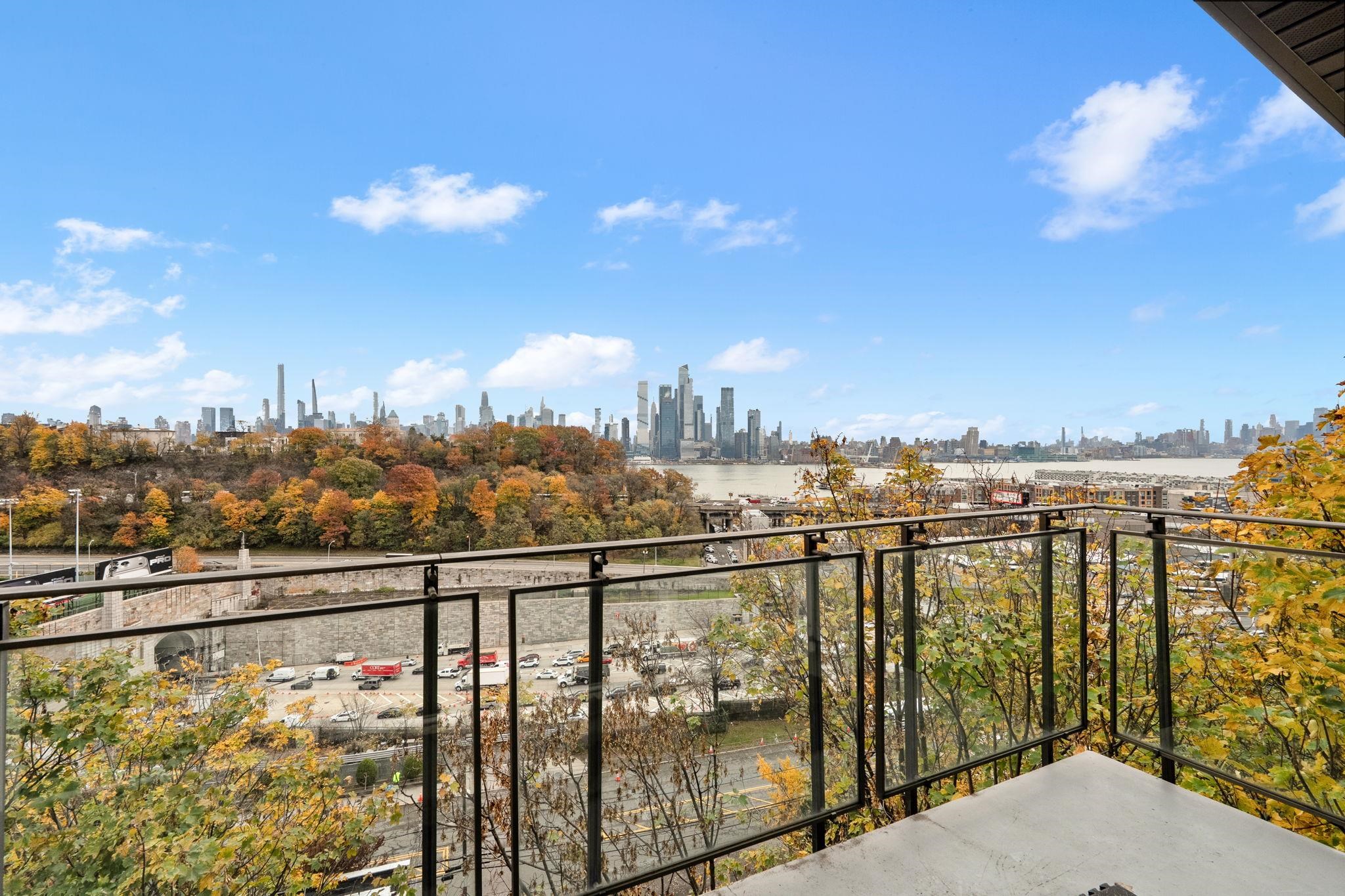 76 Hackensack Plank Road Weehawken, NJ 07086 - Photo 4 of 44 a view of a city from a balcony