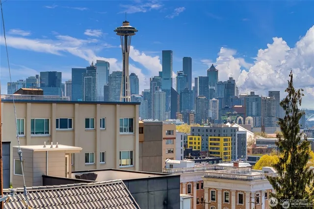 a view of a city with tall buildings