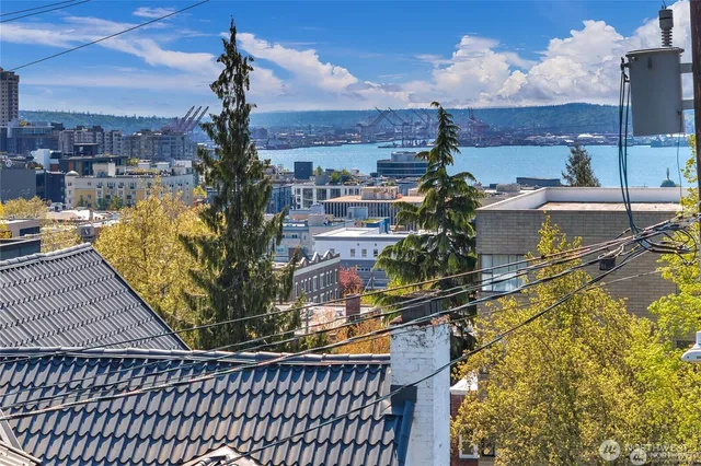a view of a balcony with sitting area