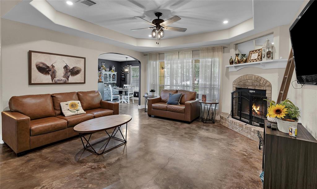 37 Bluebonnet Loop Morgan's Point Resort, TX 76513 - Photo 5 of 38 Spacious living area featuring stained concrete flooring and a tray ceiling