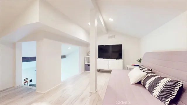 a bathroom with double sink and a mirror