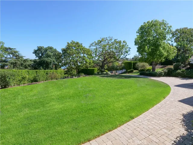 a bathroom with a sink double vanity and a mirror