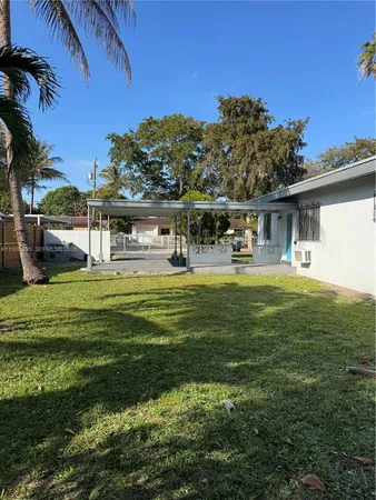 a view of a park with swings and slides