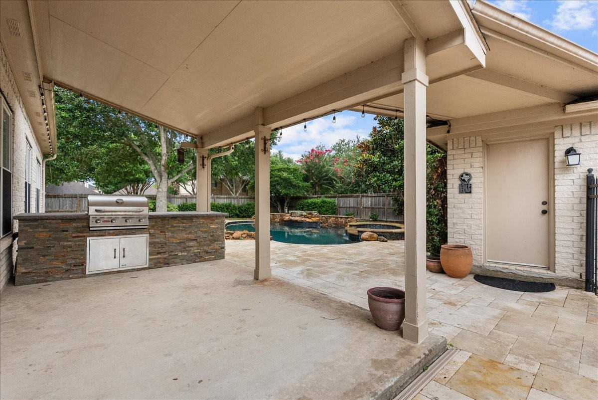 2876 Match Point Lane Friendswood, TX 77546 - Photo 40 of 45 Built in grill perfect for your summer nights around the pool!