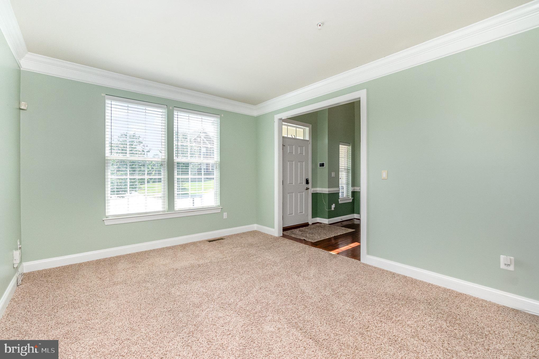 10535 Windlass Run Road Baltimore, MD 21220 - Photo 14 of 42 an empty room with a empty space and windows