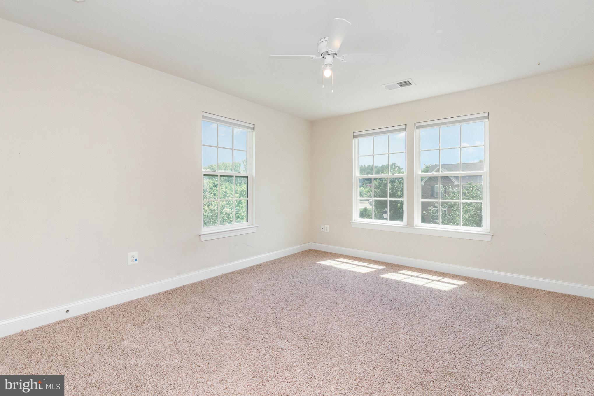 10535 Windlass Run Road Baltimore, MD 21220 - Photo 27 of 42 a view of an empty room with a window