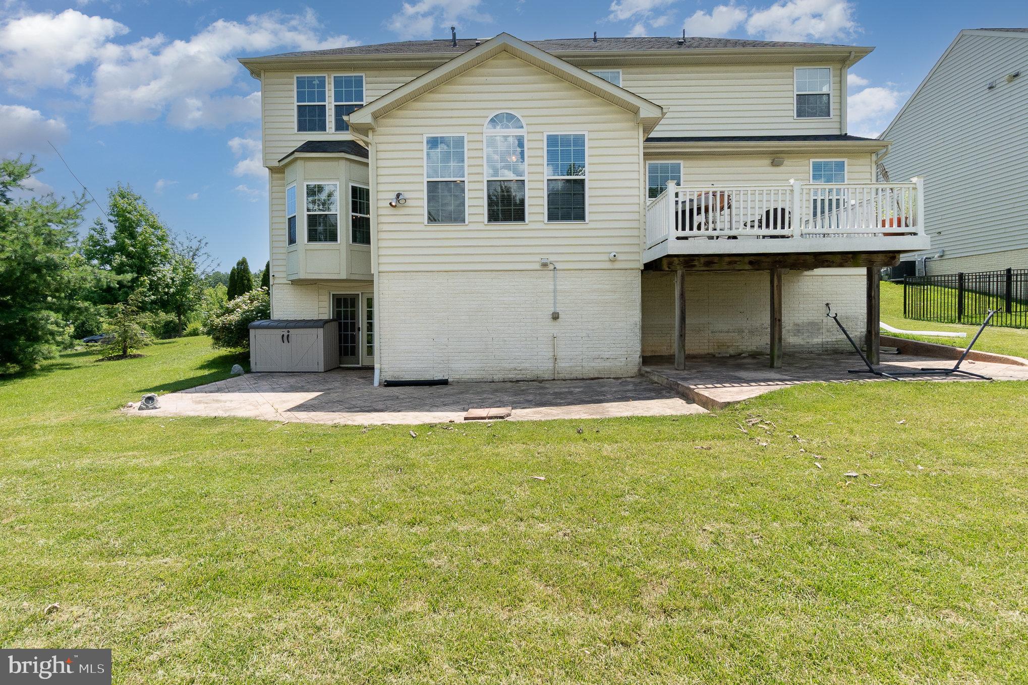 10535 Windlass Run Road Baltimore, MD 21220 - Photo 39 of 42 a front view of a house with a yard