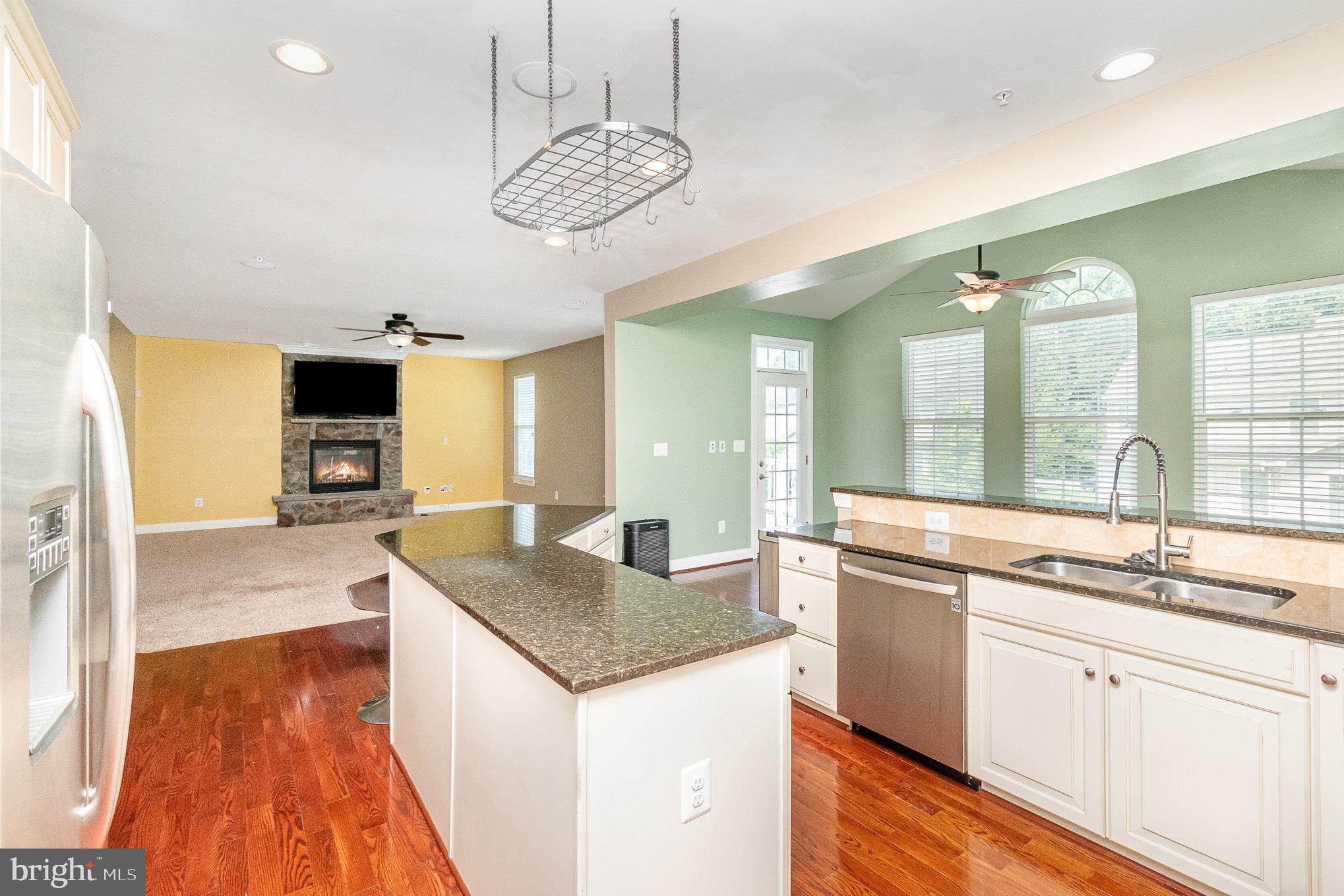 10535 Windlass Run Road Baltimore, MD 21220 - Photo 6 of 42 a kitchen with stainless steel appliances granite countertop a sink and a oven