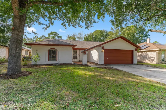 a house view with a garden space