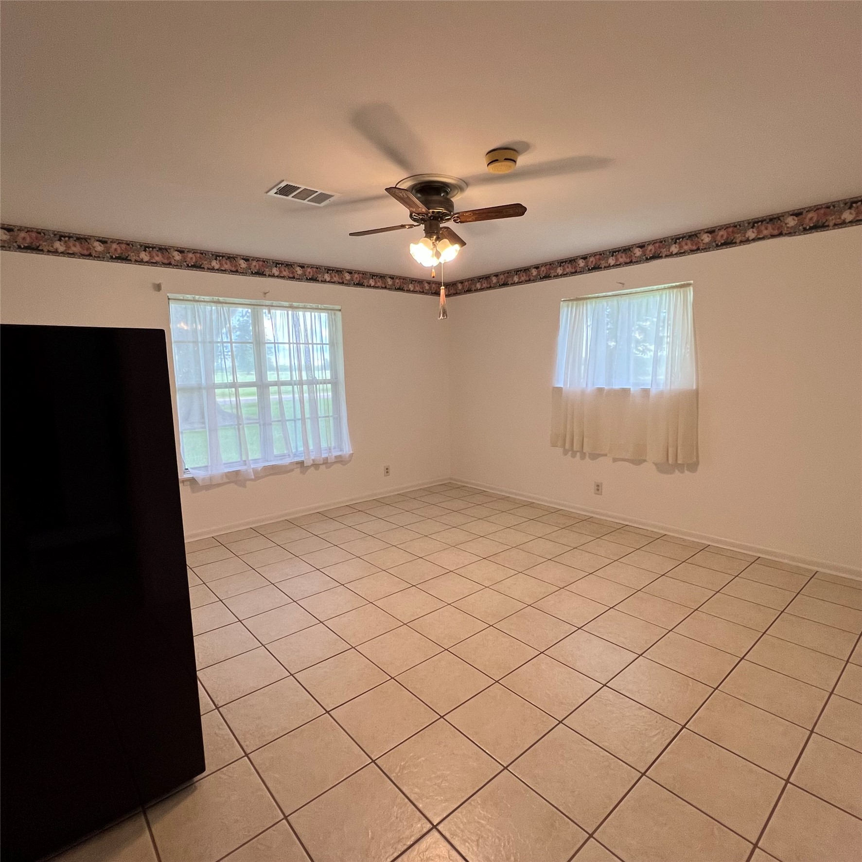 402 Peach Point Road Jones Creek, TX 77541 - Photo 21 of 32 Primary bedroom