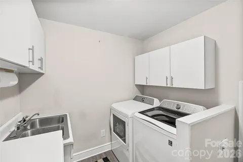 a view of kitchen and sink