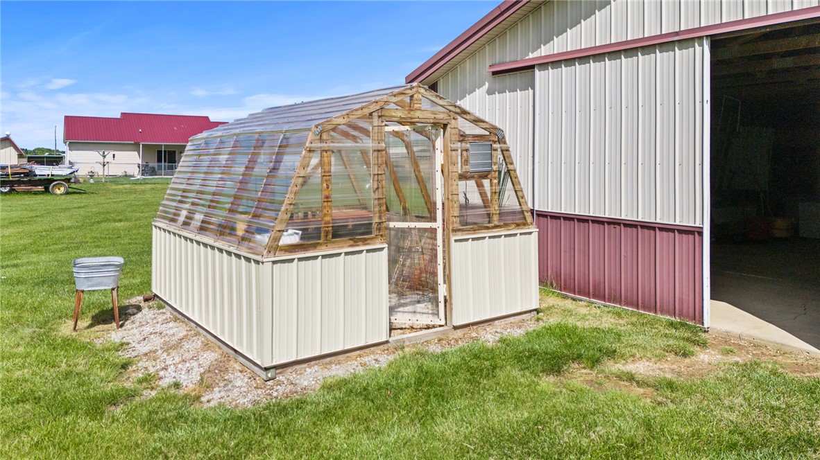 4222 Ramsey Road Springfield, OH 45502 - Photo 32 of 79 This property features a charming greenhouse, perfect for cultivating your favorite plants and herbs.