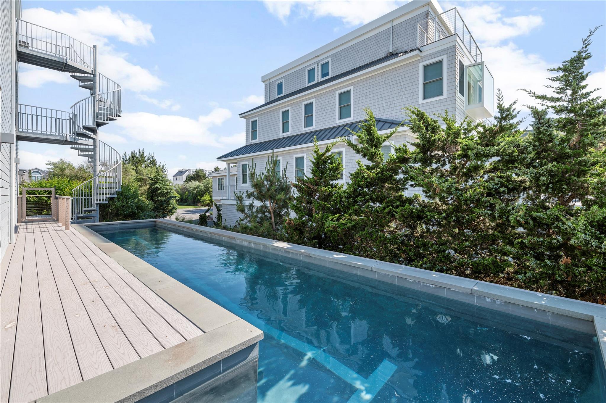 846 Dune Road West Hampton Dunes, NY 11978 - Photo 25 of 49 a view of balcony with wooden floor and fence