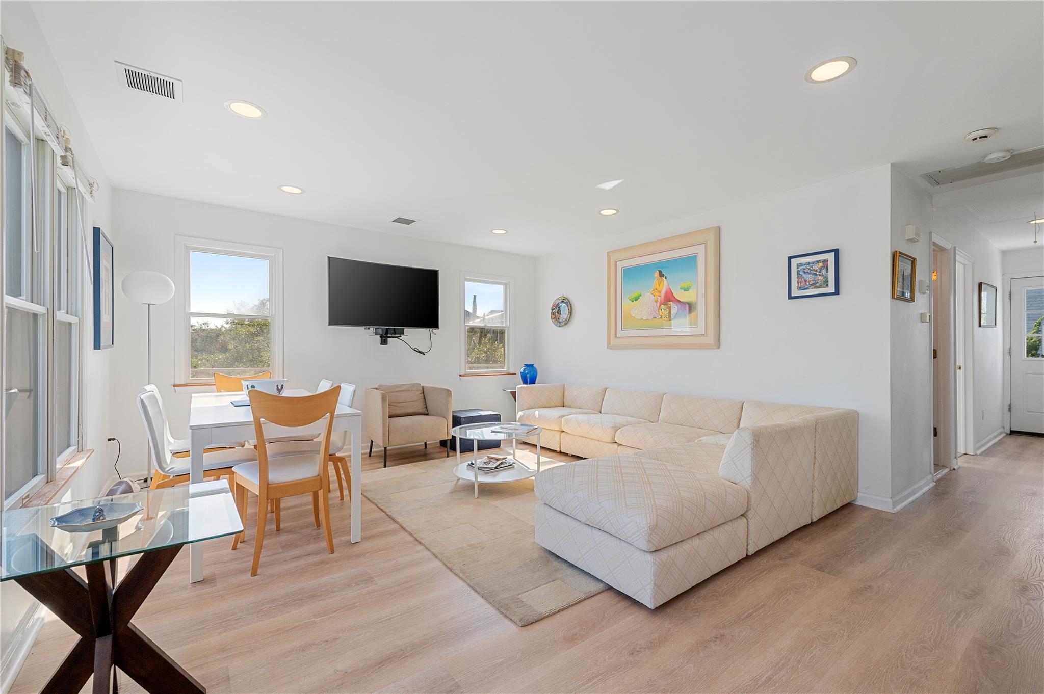 846 Dune Road West Hampton Dunes, NY 11978 - Photo 34 of 49 a living room with furniture and a flat screen tv