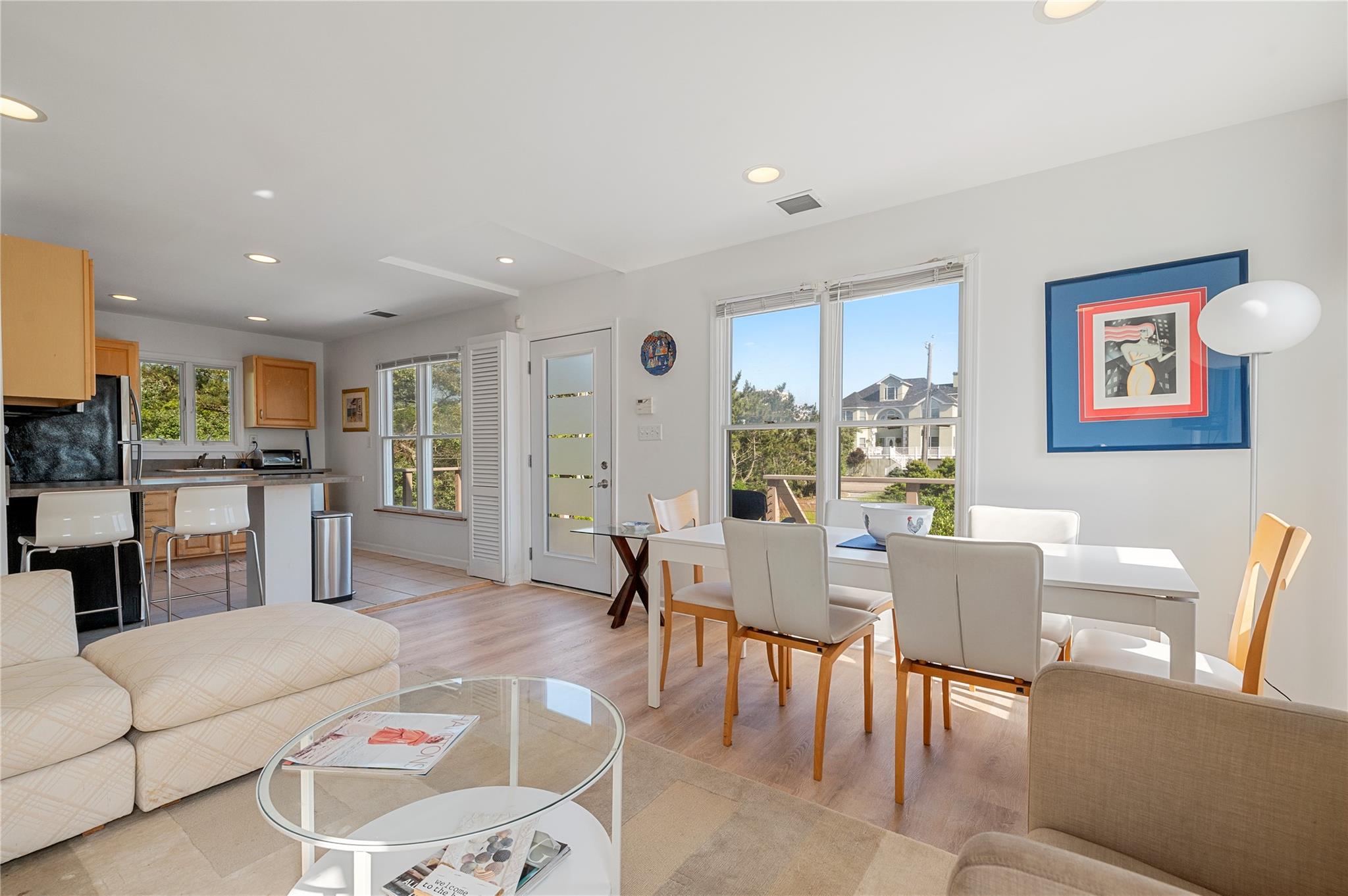 846 Dune Road West Hampton Dunes, NY 11978 - Photo 37 of 49 a view of a dining room with furniture