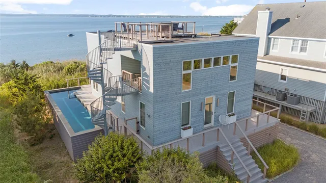 aerial view of a house with a yard