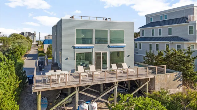 a bedroom with a bed window and a table
