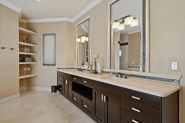 a bath room with a couch and a table