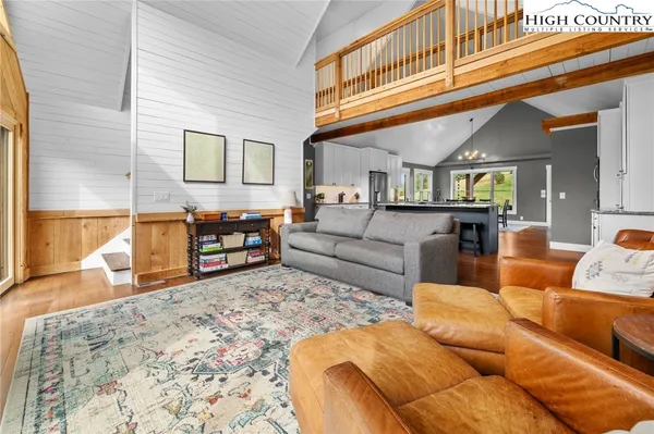 a bed room with a bed window and a couch