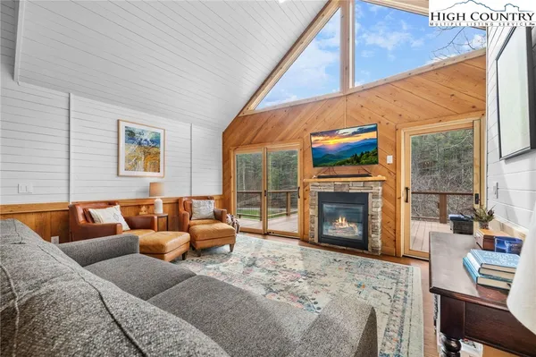 a kitchen with stainless steel appliances a refrigerator sink and cabinets