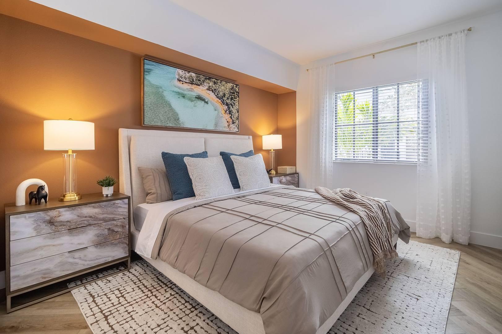 11260 Channing Way, Unit 301 Royal Palm Beach, FL 33414 - Photo 4 of 24 a bedroom with a bed and a painting on the wall