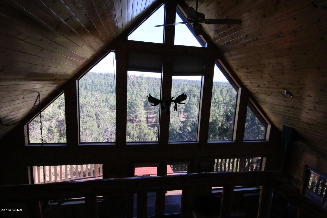 2885 Cedar Ridge Drive Overgaard, AZ 85933 - Photo 25 of 43 a view of a porch