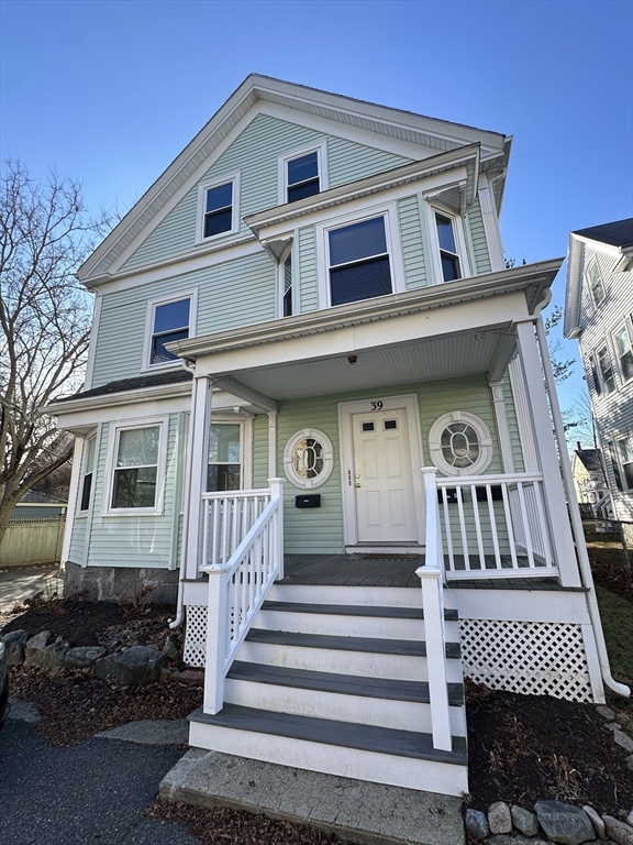 39 Thorndike Street, Unit 1 Beverly, MA 01915 - Photo 1 of 6 a front view of a house