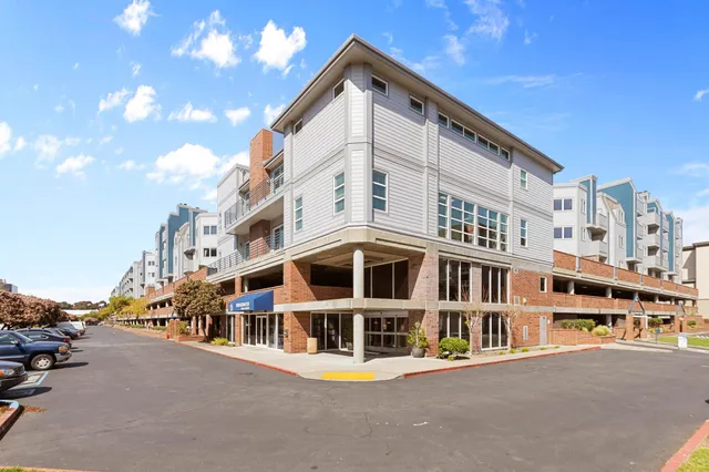 a house with swimming pool in front of it