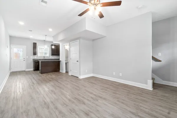 a view of a kitchen with a sink and a microwave