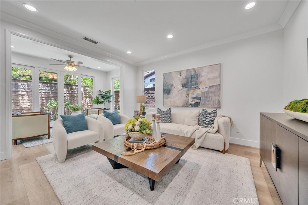 55 Open Range Irvine, CA 92602 - Photo 22 of 66 a living room with furniture and a large window